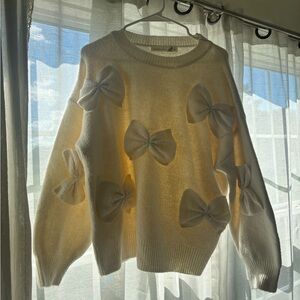 Altar'd State Ivory Bow-Embellished Sweater